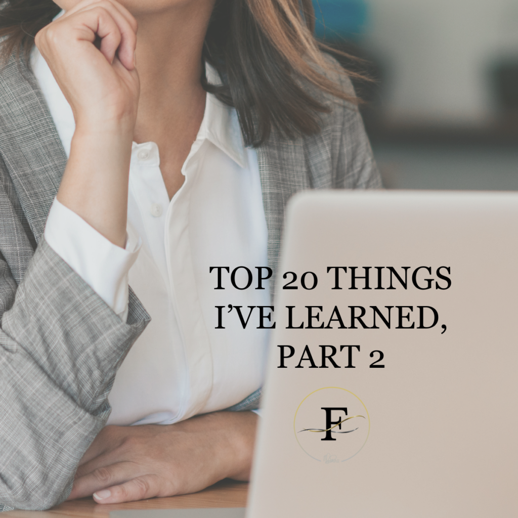 Business woman reflecting in front of a laptop